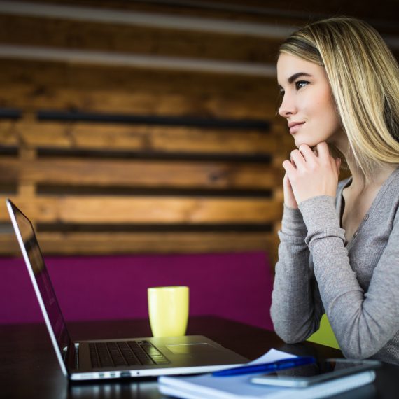 Thinking girl at working place